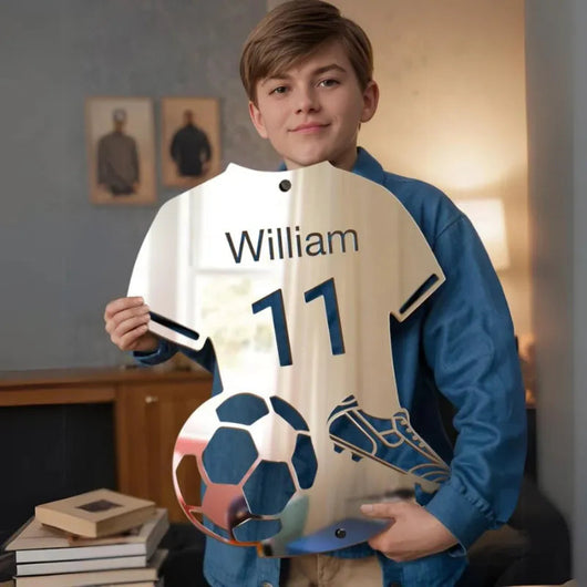 Boy holding the mirror-finish jersey panel