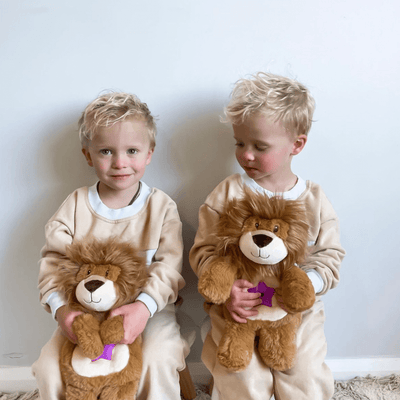 Two kids with their Glow Buddies
