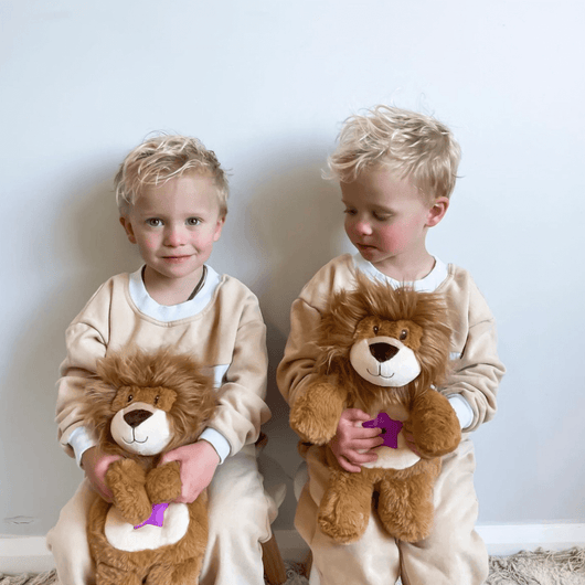 Two kids with their Glow Buddies