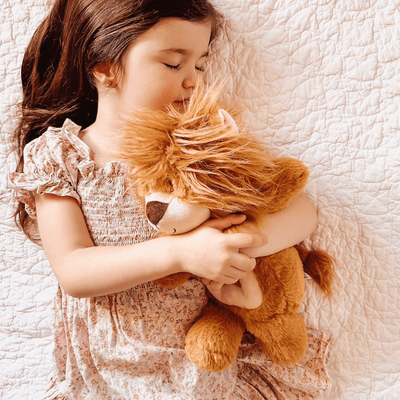 Girl hugging her lion Glow Buddy